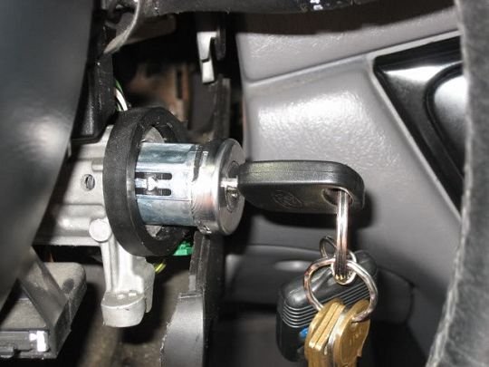 GM ignition cylinder with key inserted, removed from the steering column during a key not turning repair in San Diego