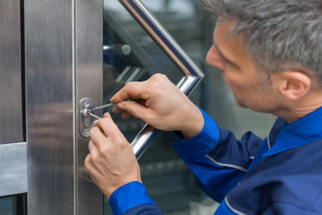 Locksmith services tech open commercial door