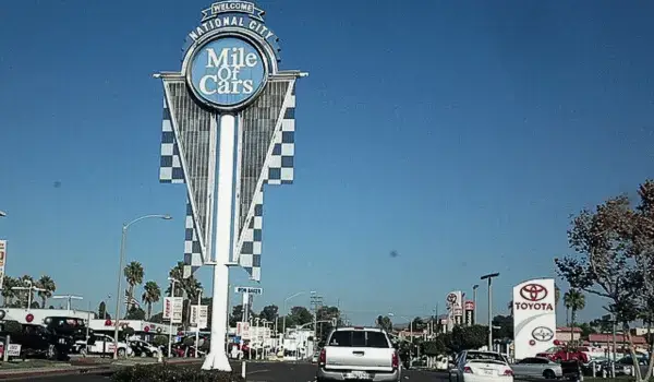 Locksmith Magic van assisting a customer in National City, CA — providing car key replacement, lockout help, and mobile locksmith service across South Bay San Diego